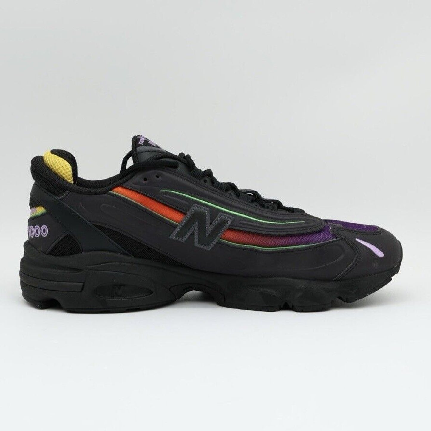 12 - New Balance 1000 Reflective Pack - ‘Black / Multi-Color’ (Pre-owned)